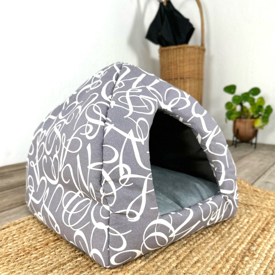 Luxury grey cat igloo bed with white swirl design and a removable cushion