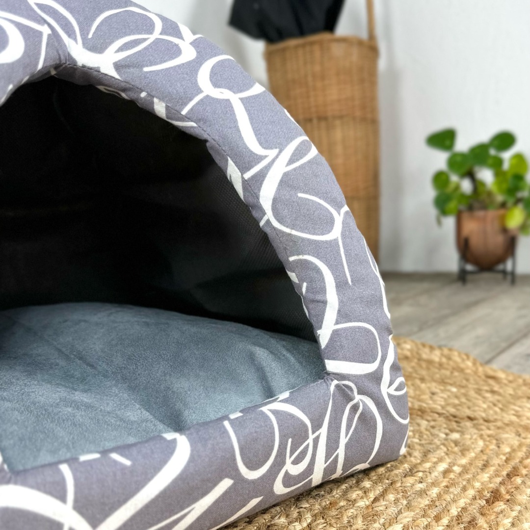 Luxury grey cat igloo bed with white swirl design and a removable cushion